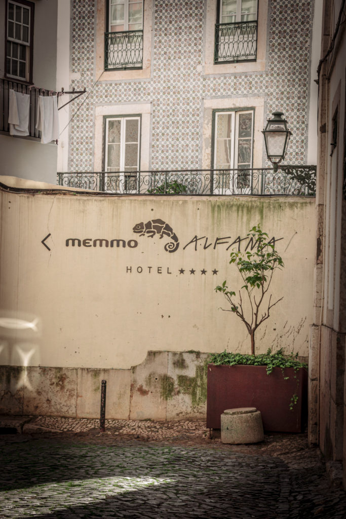 Image of a sign with a chameleon for Alfania Hotel in Lisbon, Portugal